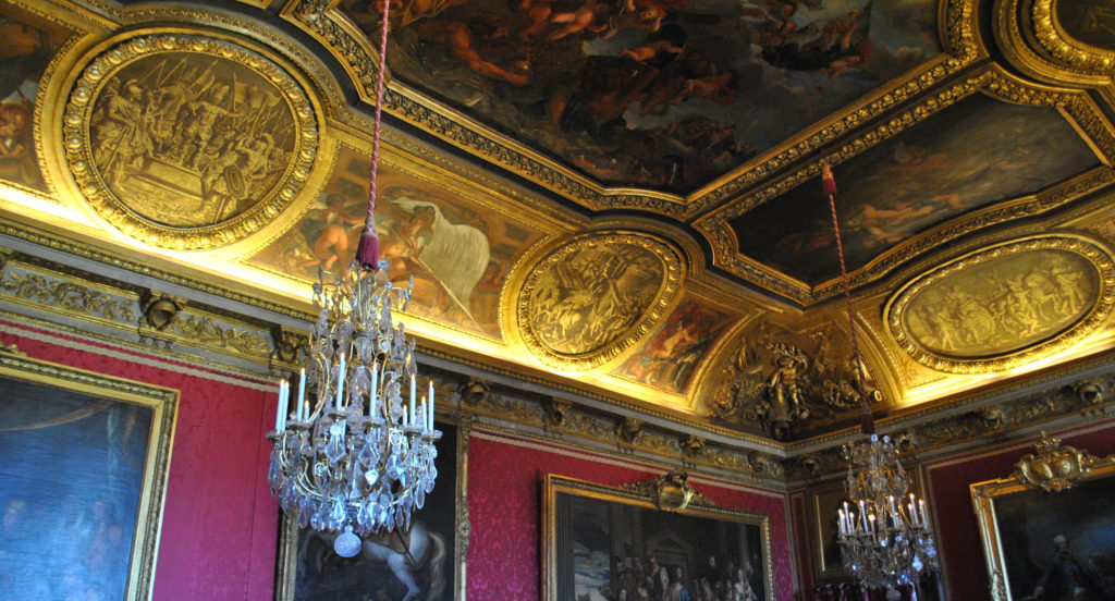 Red walls in Mars Salon at the Palace of Versailles