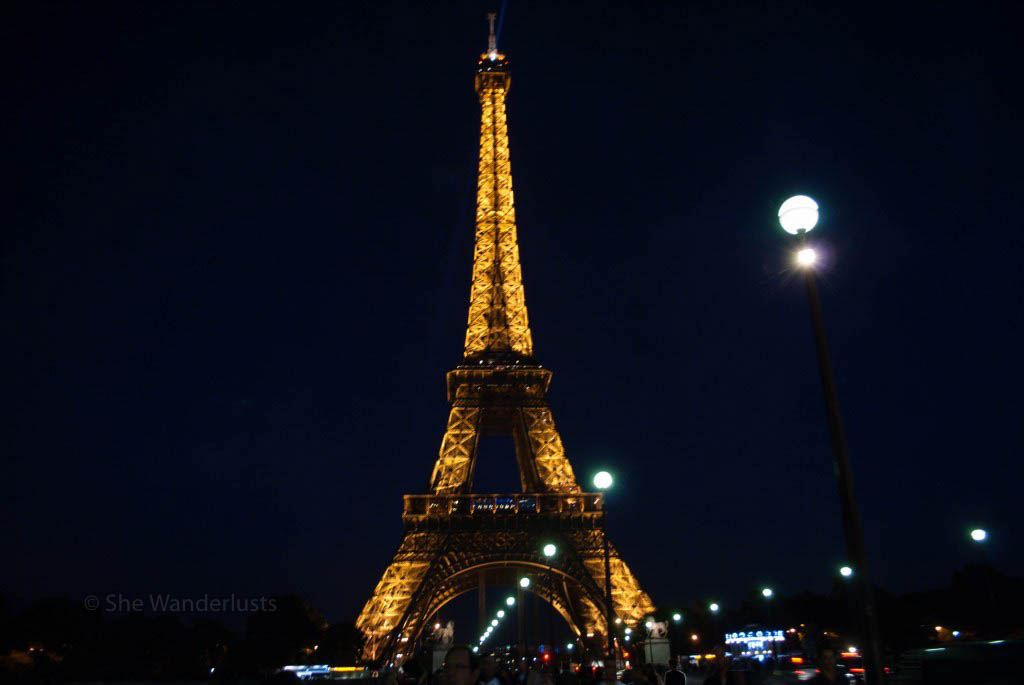 Eiffel Tower and lamp lights at night
