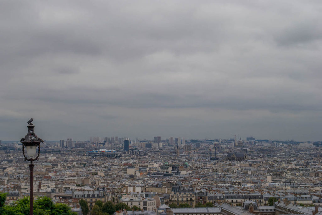 View of City of Paris near Walking in Sacre-Coeur in Montmartre