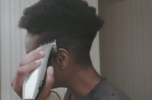 Black girl cuts her own hair short